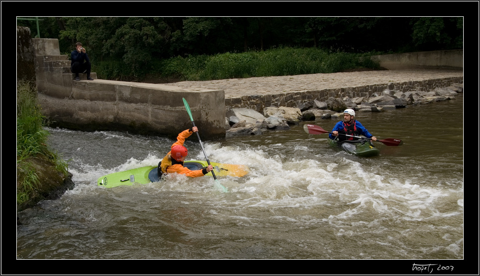 Having fun on a small wave coming from the weir